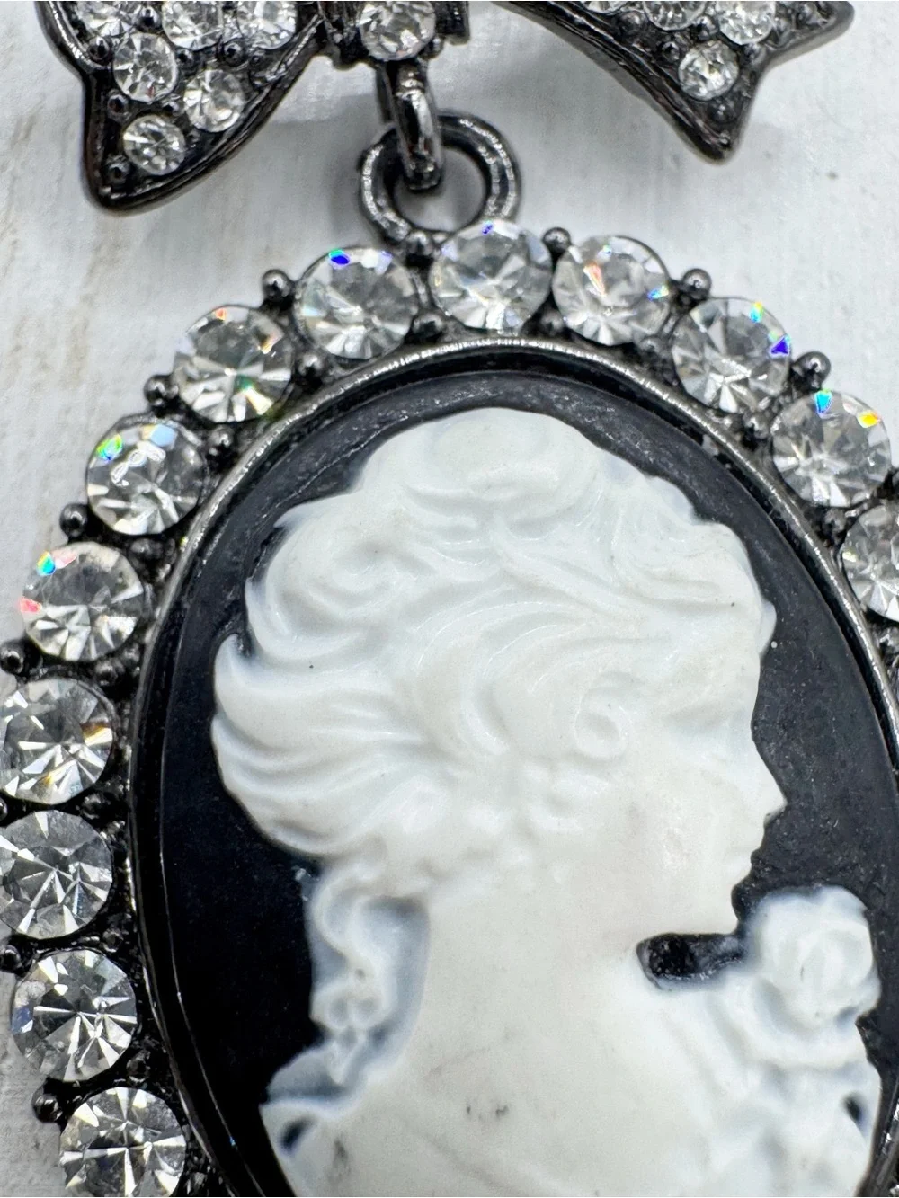 Vintage Victorian revival cameo bow brooch pin black white